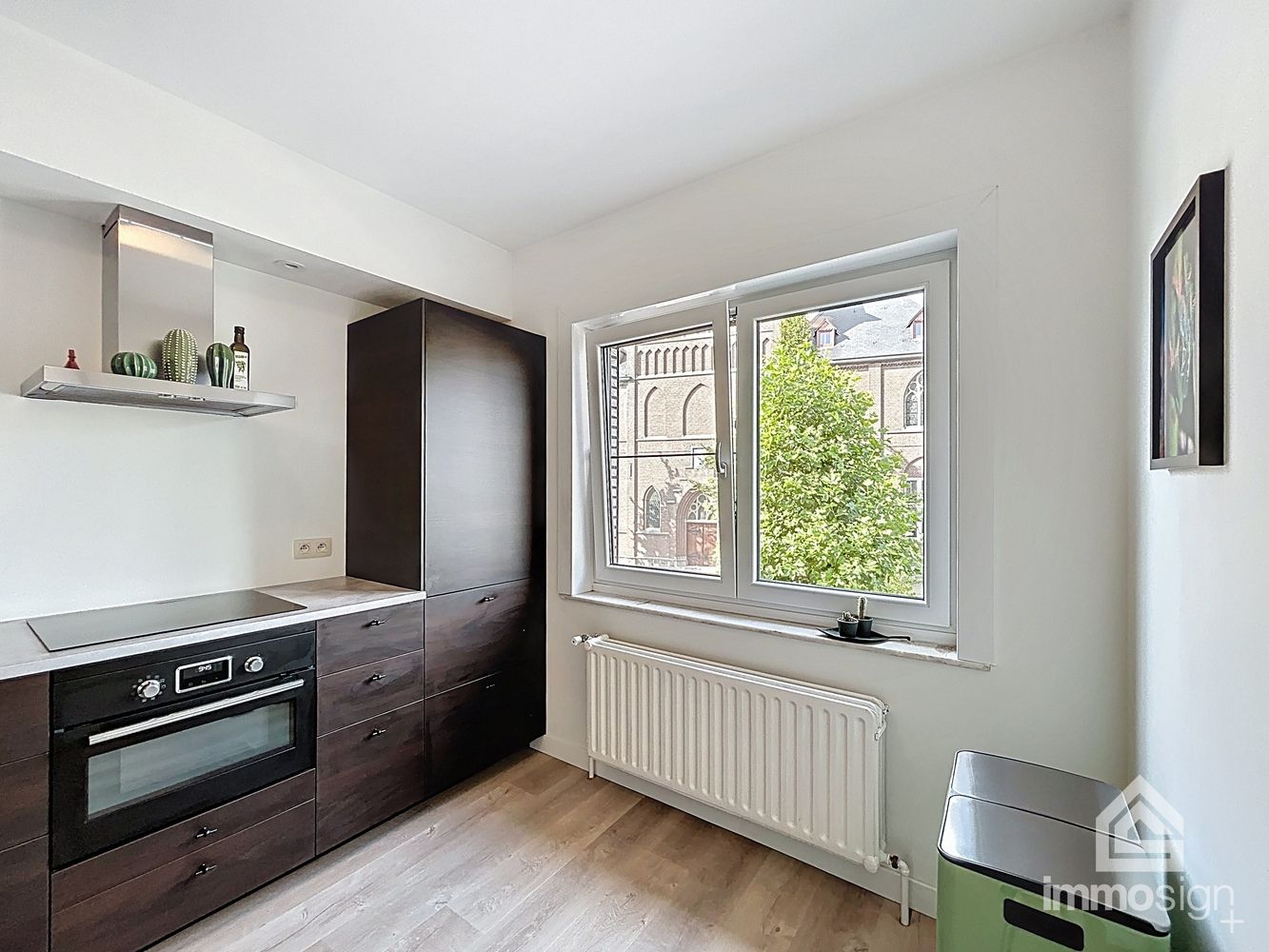 Instapklaar appartement met vernieuwd interieur, 3 slaapkamers en garage in hartje Hamont foto 10