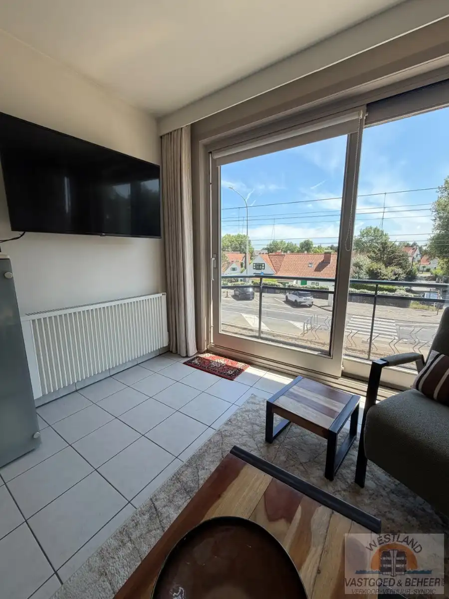 Lichtrijk hoekappartement met 1 slaapkamer foto 6