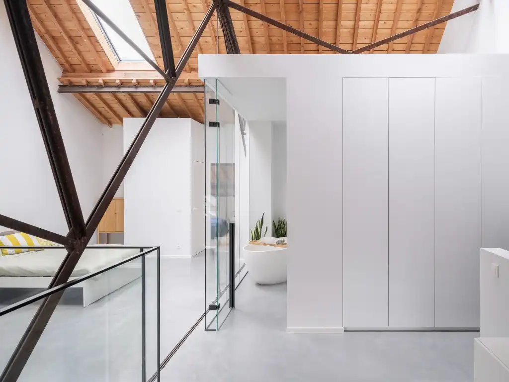 Luxueus en tijdloos – Exceptionele loft met 2 slaapkamers, aparte bureauruimte en ruim terras in een beschermd gebouw met een rijke industriële voorgeschiedenis. foto 17