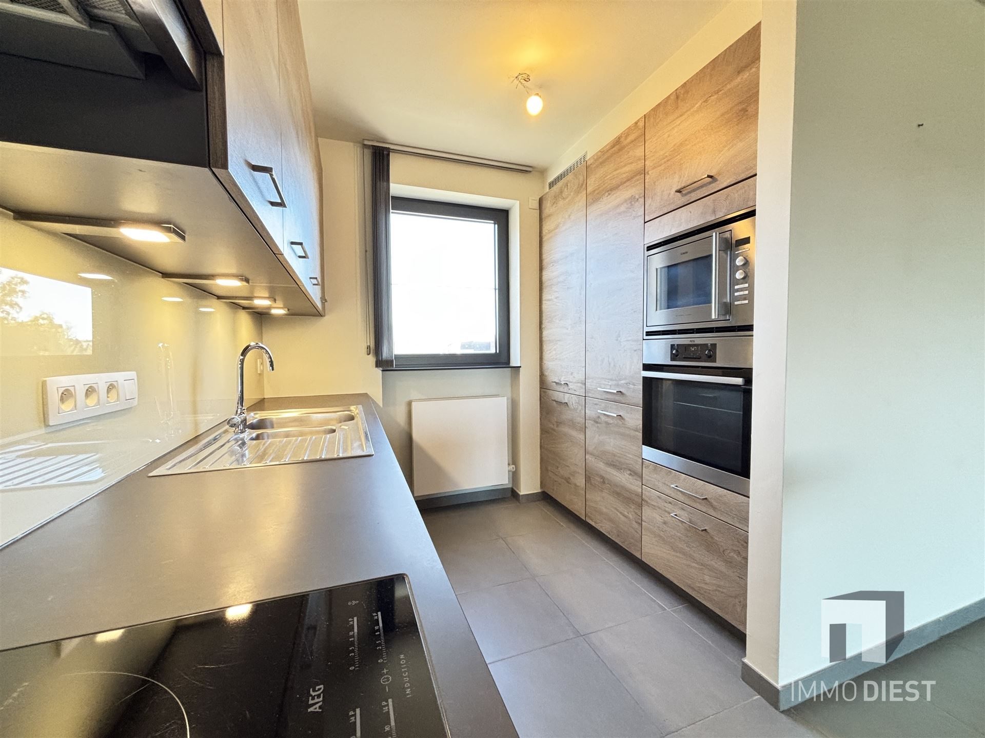 Ruim appartement op de tweede verdieping in het centrum van Tessenderlo foto 6