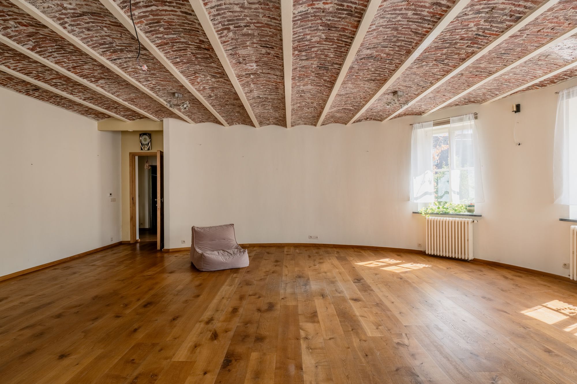 Wordt ‘King of The Castle’ in dit appartement met balzaal, terras van 15 m² en ondergrondse autostaanplaats foto 3