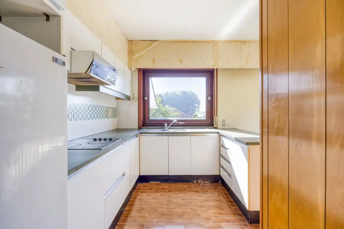 te renoveren huis op een perceel van 2445m² te koop in Geel foto 14