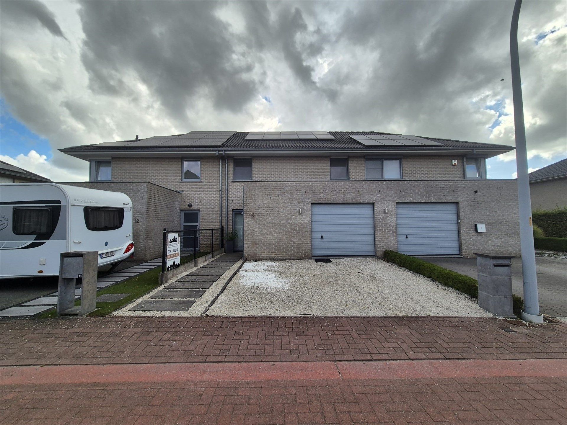 Rustig gelegen energiezuinige woning met garage.  foto {{pictureIndex}}