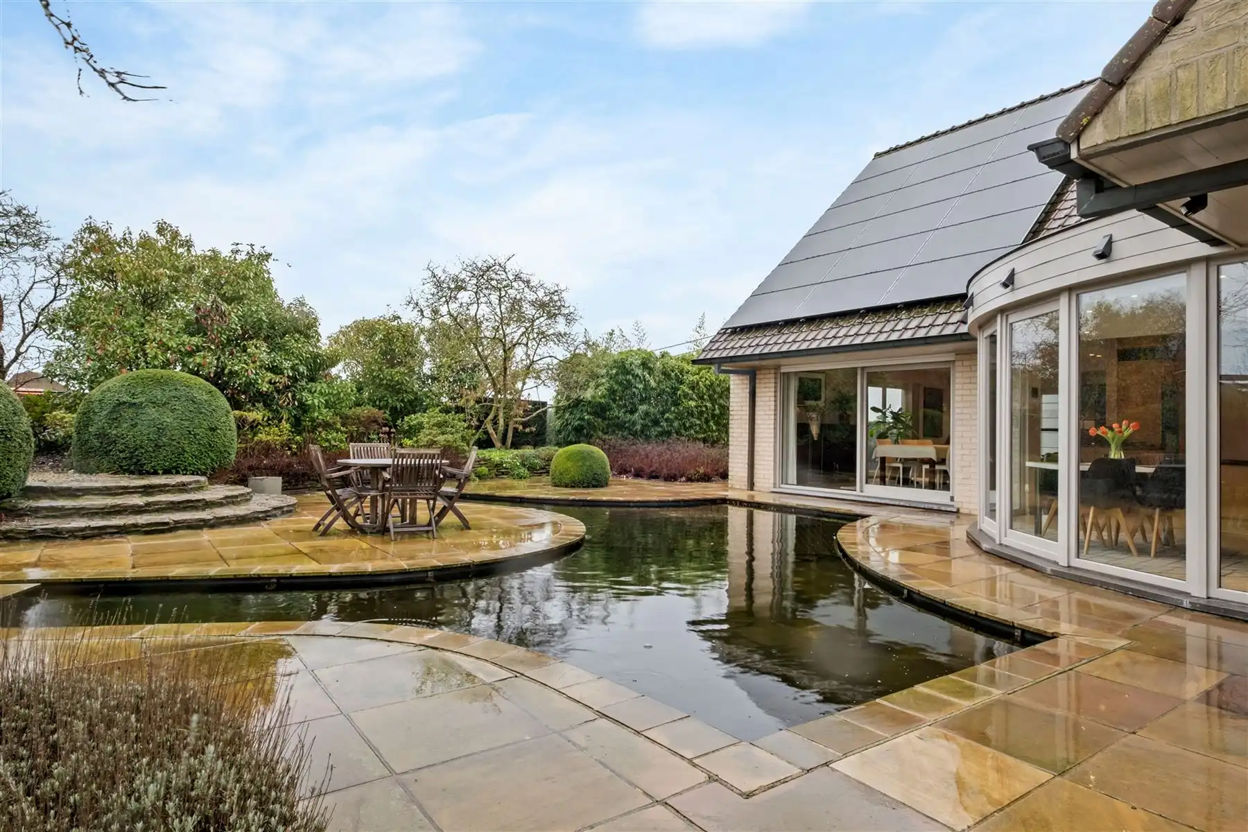 Instapklare en lichtrijke woning met zonnige tuin op 1.304 m² in Ingooigem foto 12