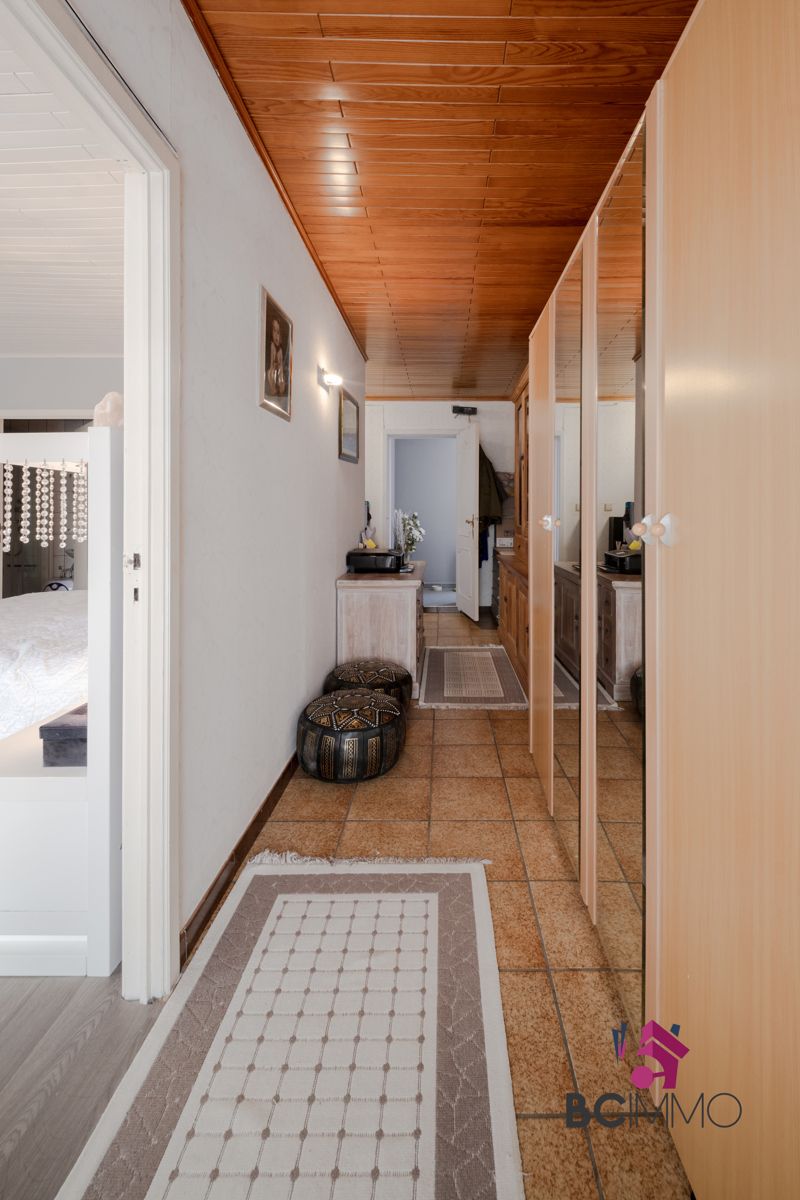 Instapklare gelijkvloerse woning met 3 slaapkamers, 2 badkamers, veranda en tuin foto 21