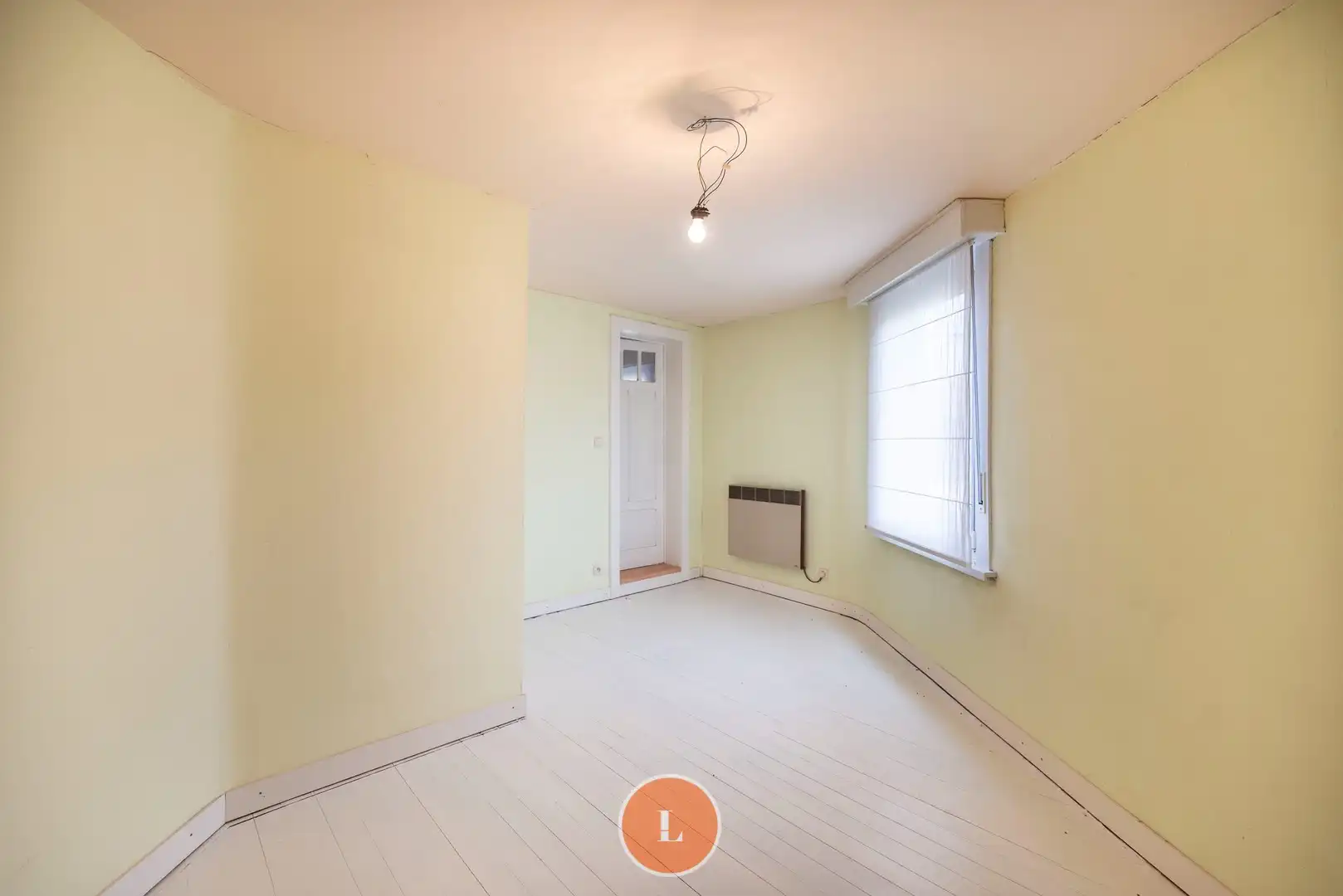 Te renoveren woning te koop in Menen foto 12