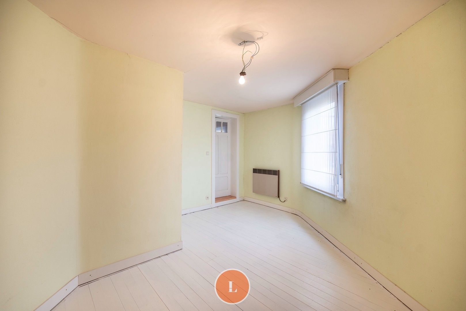 Te renoveren woning te koop in Menen foto 9