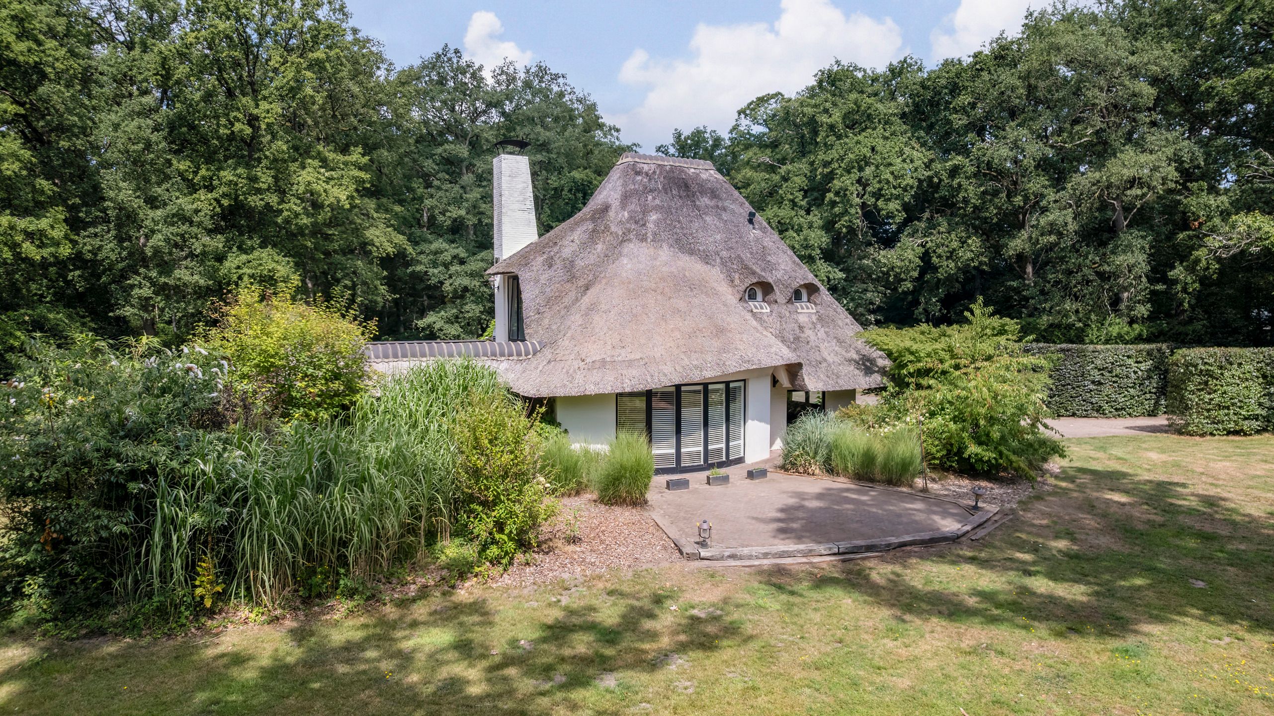 Charmante rietgedekte villa foto 45