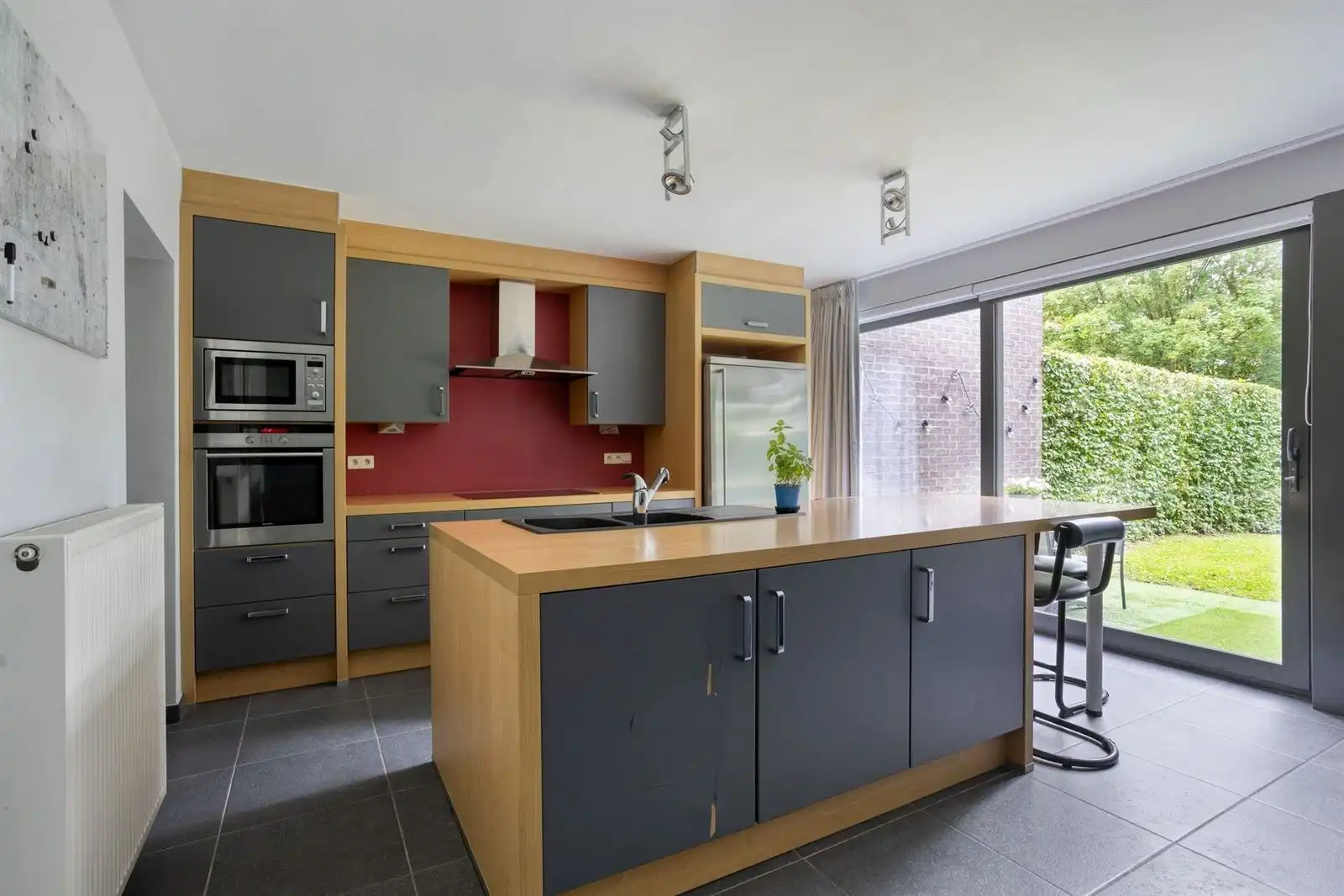 Gelijkvloers appartement met 2 slaapkamers en tuin, kelder & staanplaats foto 10