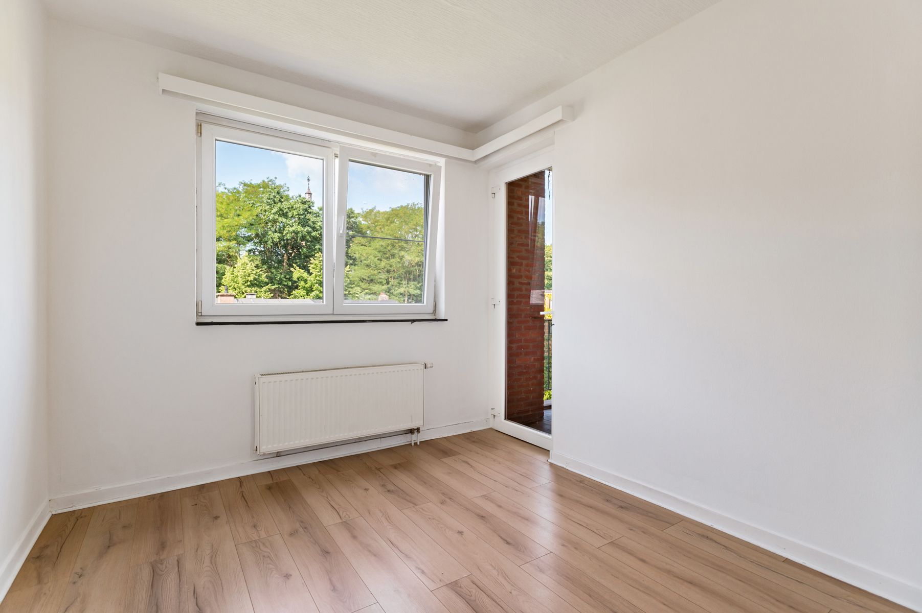 Unieke kans: 2 appartementen met tuin, garagebox en berging foto 25