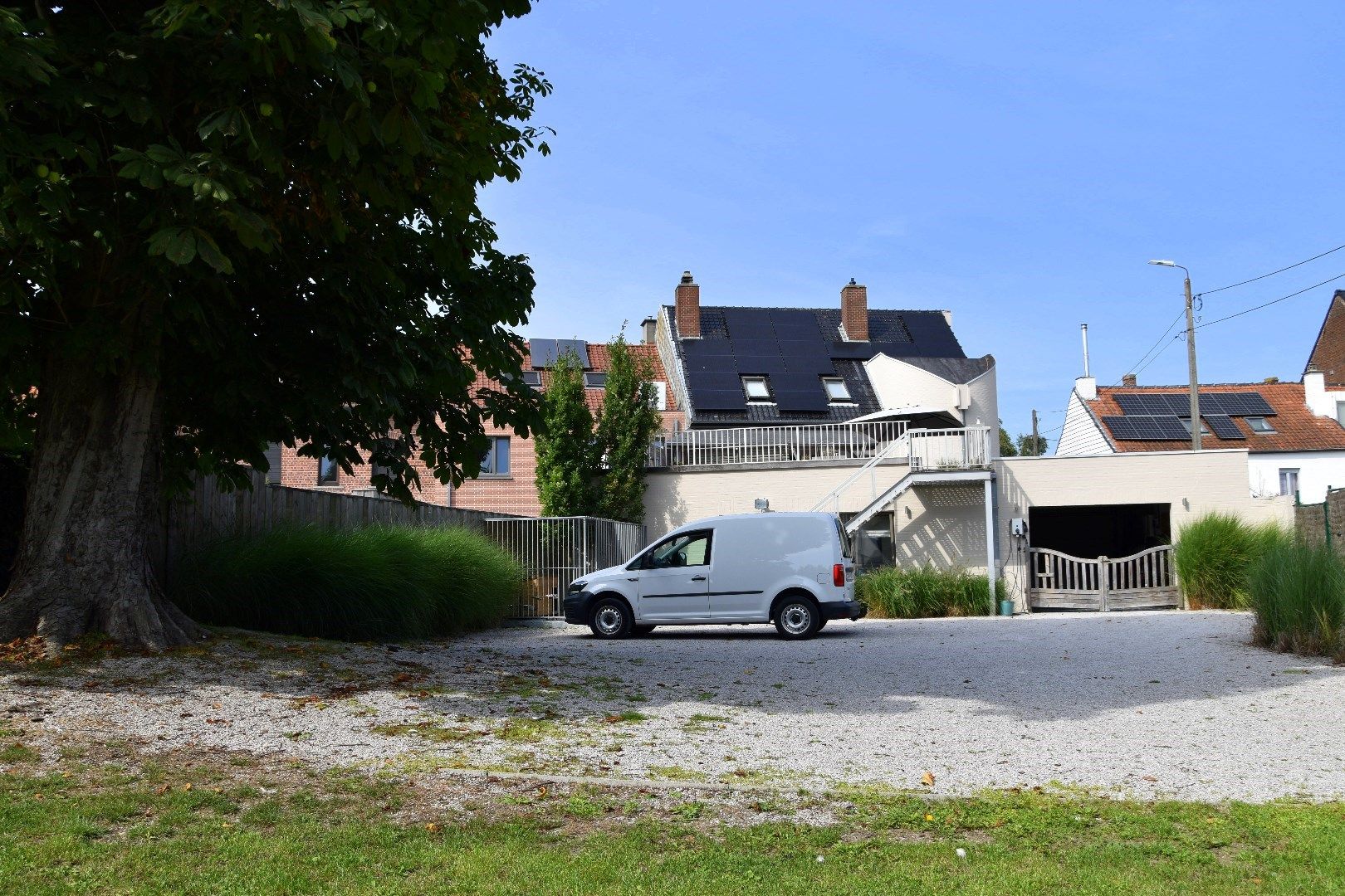 Unieke eigendom met 5 slaapkamers, groot terras én zonnige tuin in het centrum van Gullegem foto 21