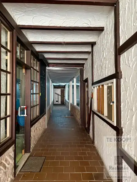 2 Appartementen + 4 winkels foto 2