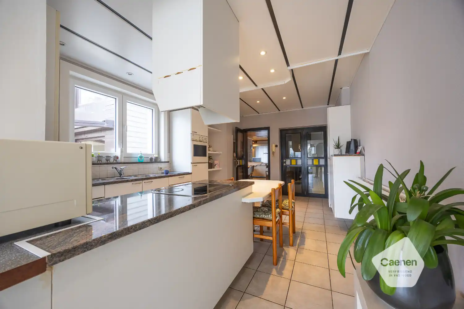 Woning met handelsgelijkvloers op commerciële ligging foto 12