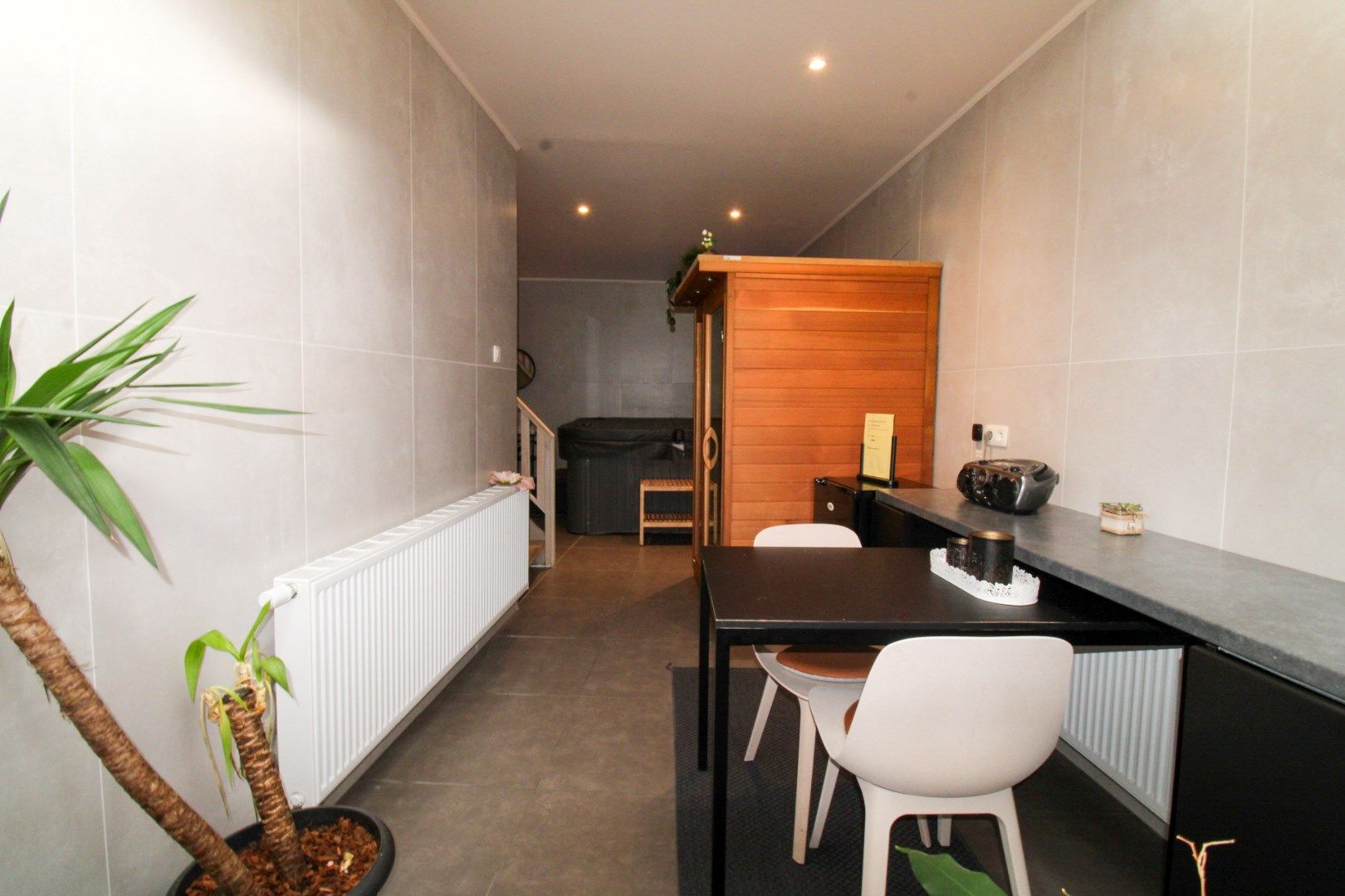 Veelzijdig handelshuis met woonst en luxueuze B&B op toplocatie aan de Markt van Temse! foto 21