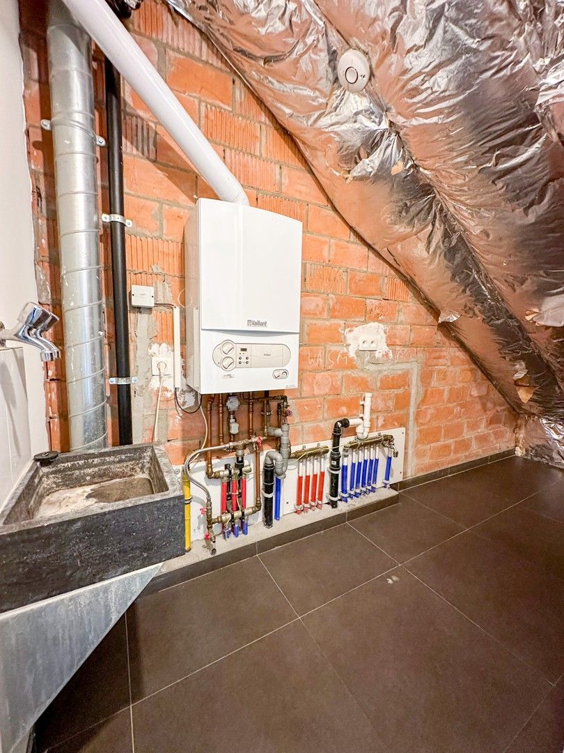 Instapklaar 2-slaapkamerappartement in het centrum van Zomergem foto 10