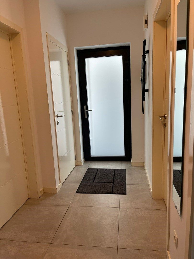 Moderne duplex van 130m² met 3 slaapkamers en parking te Dilsen foto 3