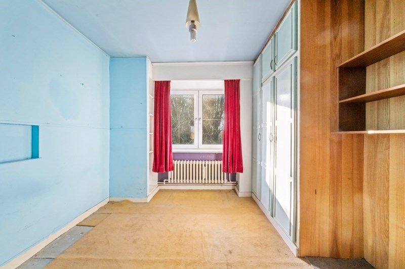 Ruime te renoveren rijwoning met zeer veel mogelijkheden en tuin foto 11