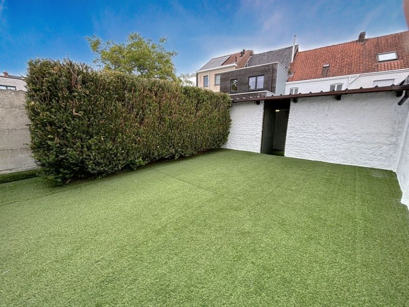 Knusse rijwoning foto 20
