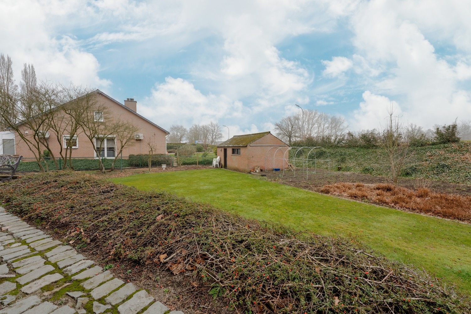 Mooie instapklare  woning op 1170m² dichtbij de grens! foto 30