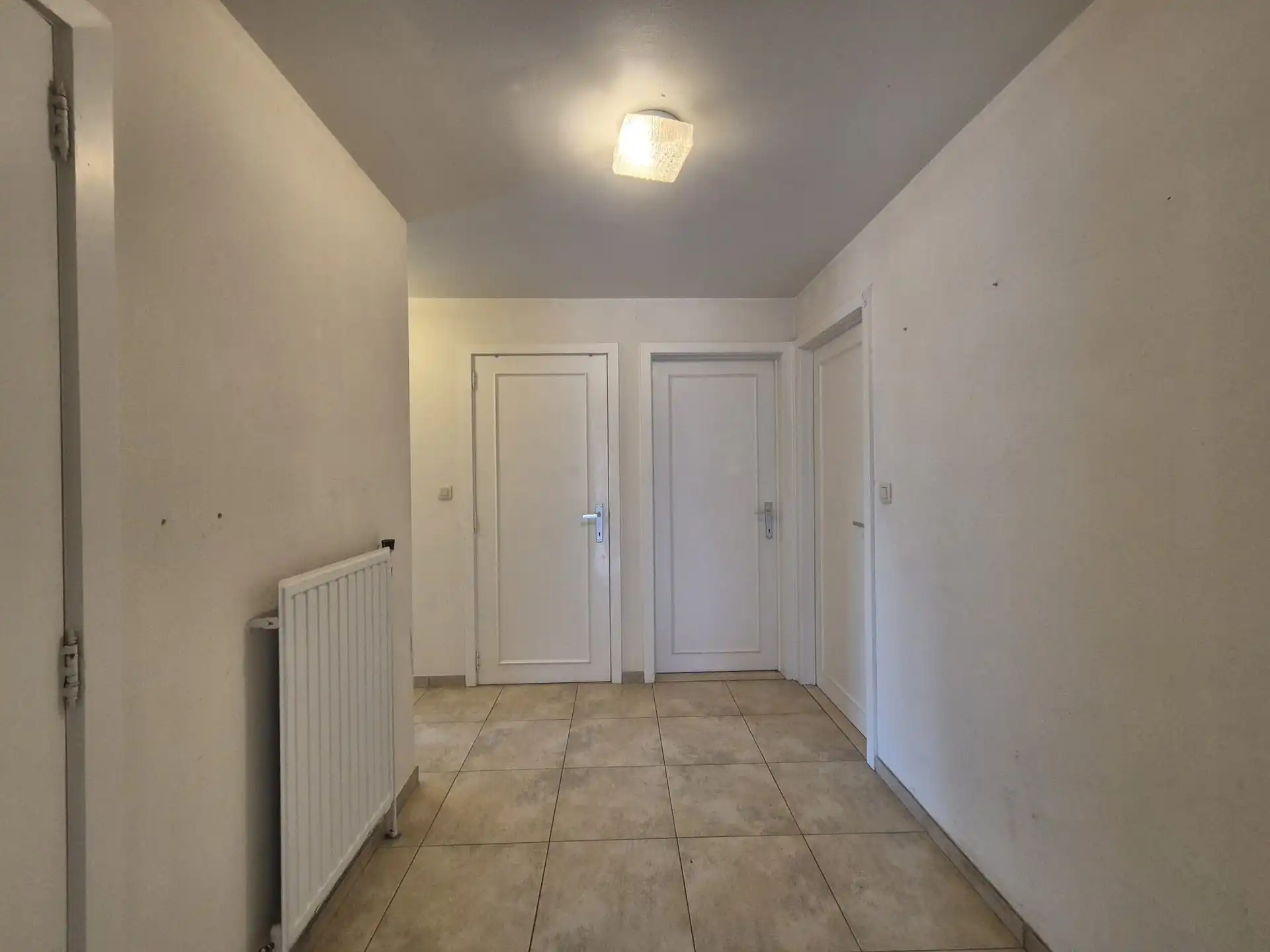 Centraal gelegen ruim appartement met groot zongericht terras en garage. foto 21