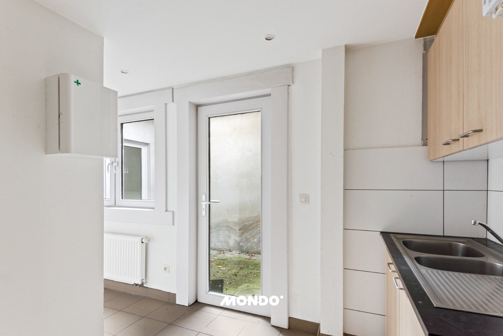 Rustig gelegen woning met 3 slaapkamers en veel potentieel nabij het centrum! foto 10