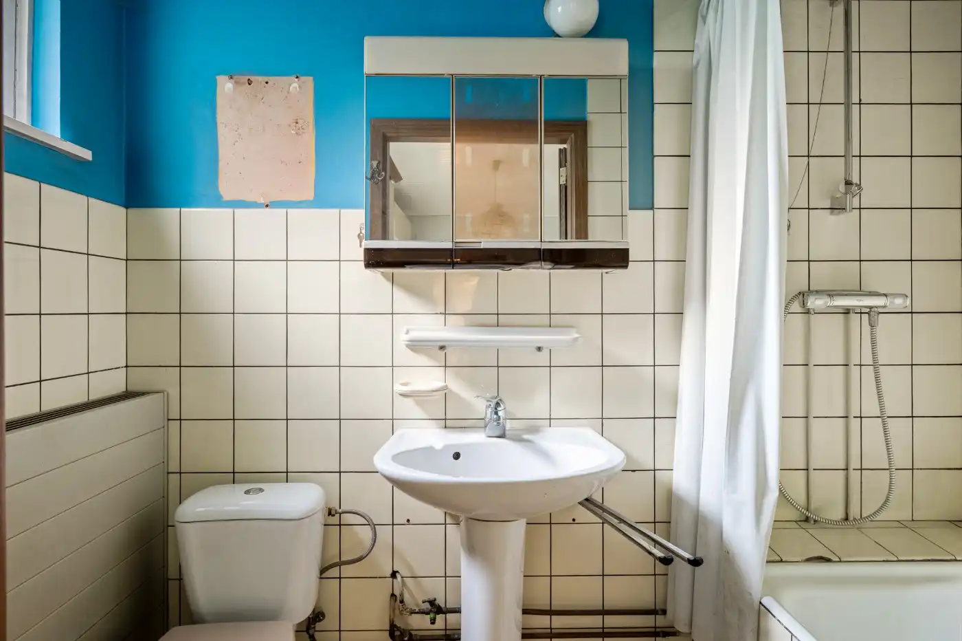 Te renoveren woning met 3 à 4 slpk. en inpandige garage foto 8