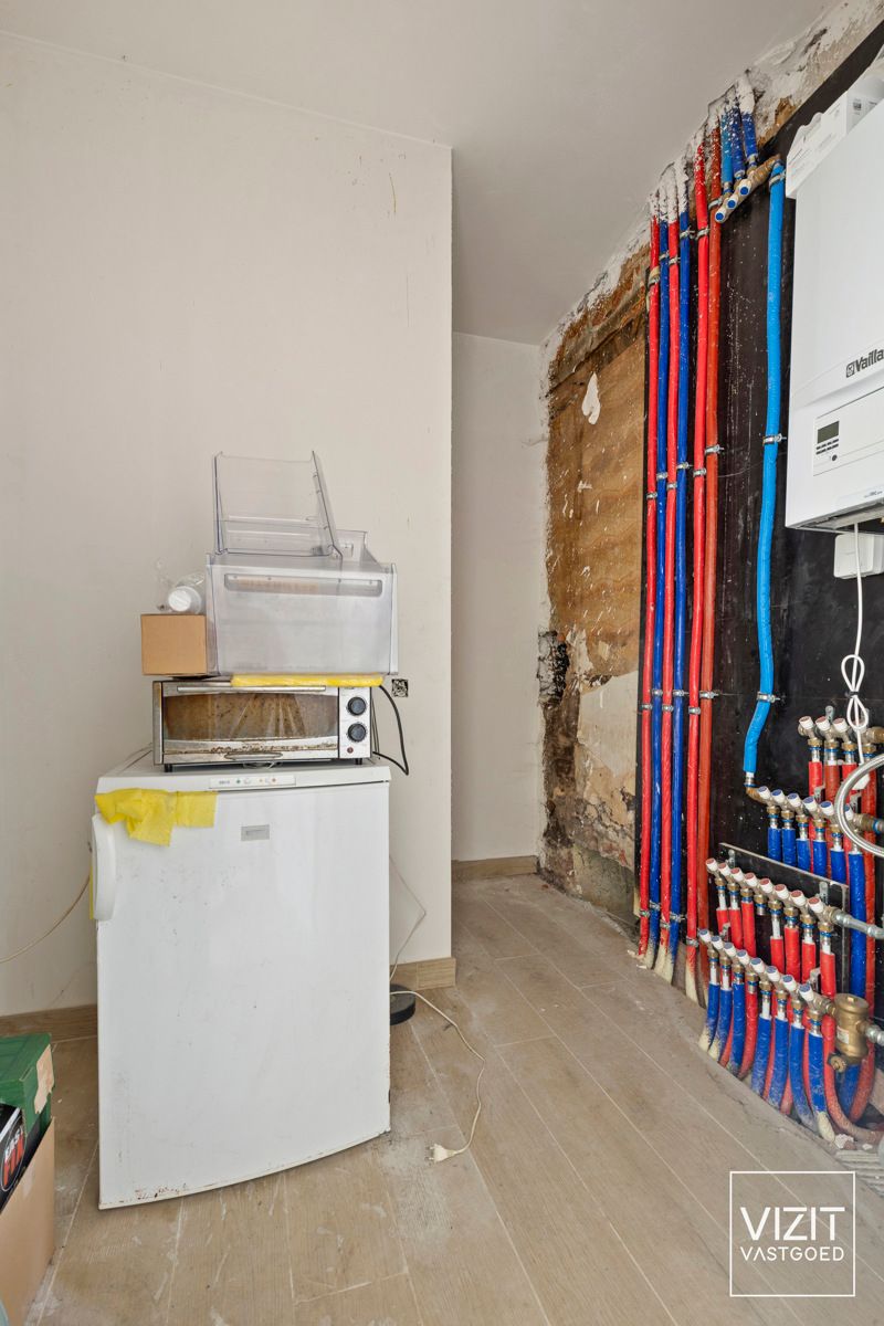 Te renoveren woning met grote tuin nabij centrum Ninove foto 3
