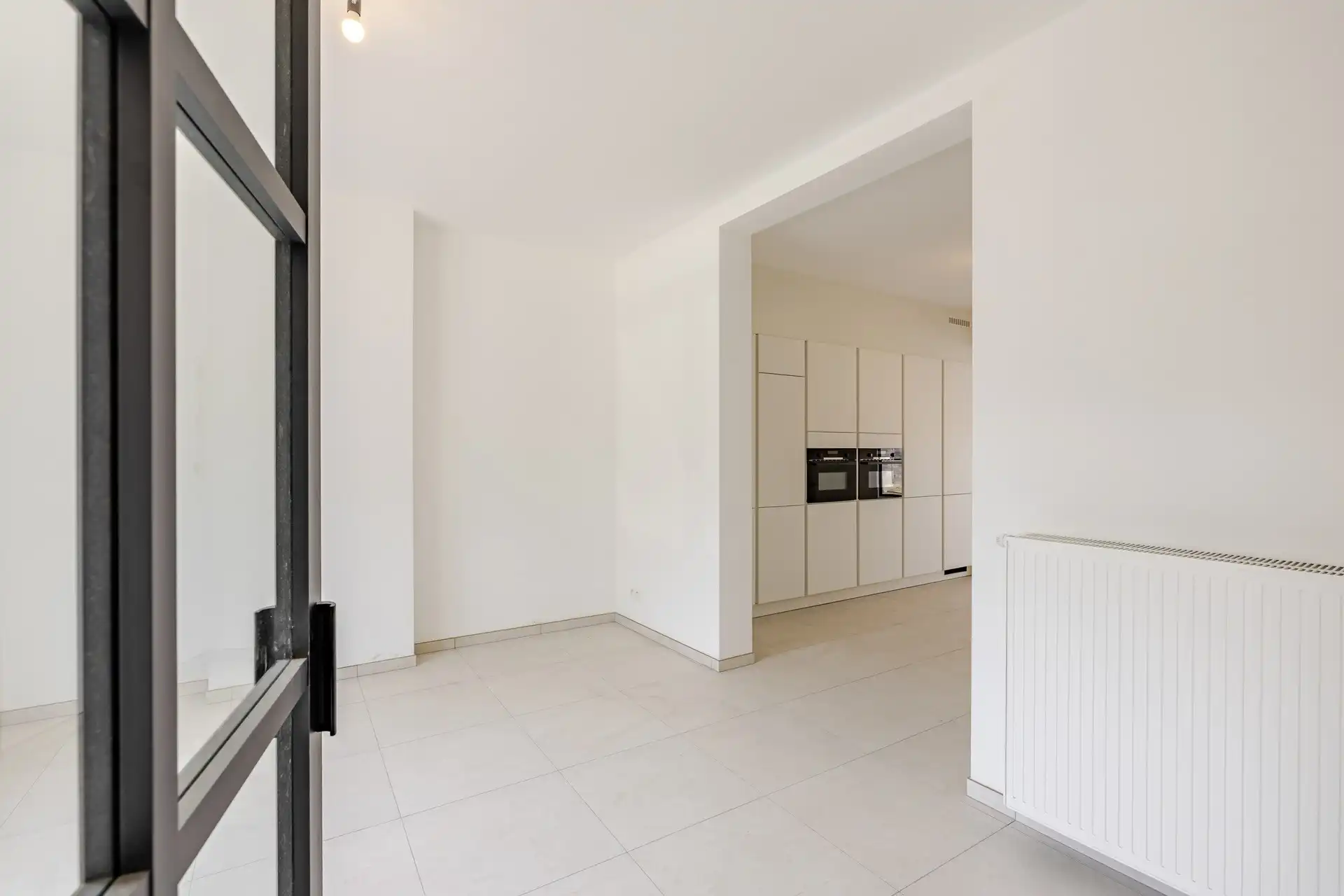 Instapklare, volledig gerenoveerde gezinswoning met 4 slaapkamers, garage en zonnige stadstuin foto 5
