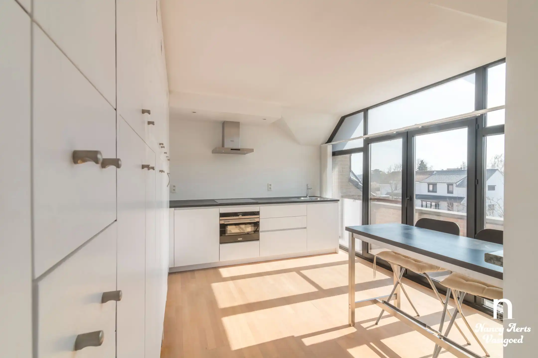 Ruim, lichtrijk appartement met zonnig terras in hartje Paal foto 10