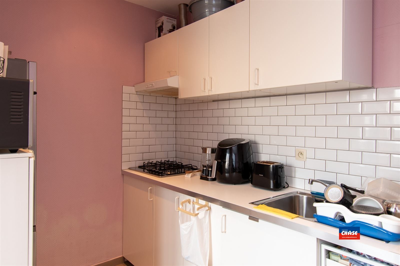Twee gelijkvloersappartementen met grote koer en polyvalente ruimte foto 3