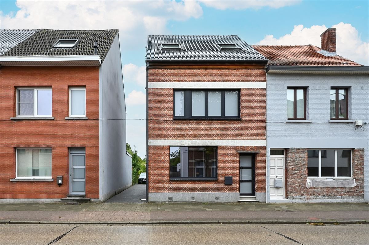Geheel gerenoveerde gezinswoning met ruime garage foto 37