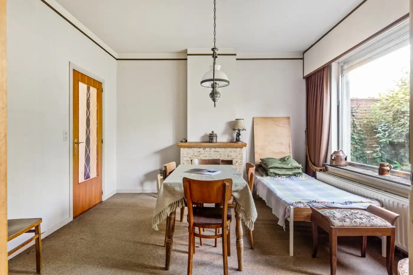 Te renoveren woning met 3 à 4 slpk., garage en tuintje foto 14