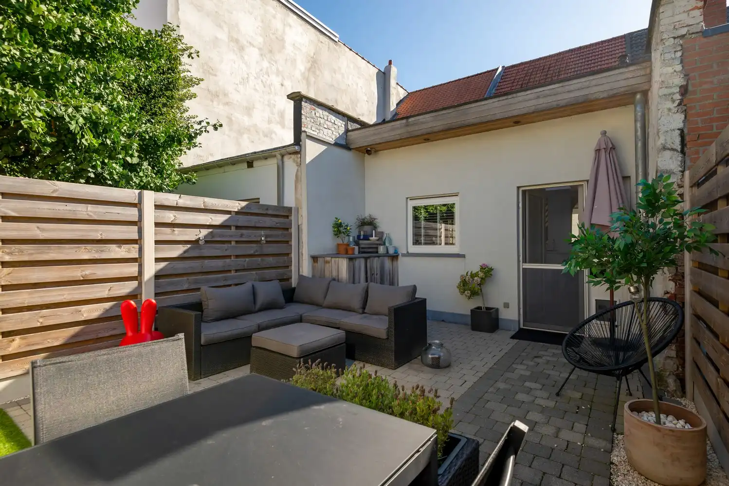 Gezellige gerenoveerde woning met 2 slaapkamers en een charmante tuin in Schoten! foto 16