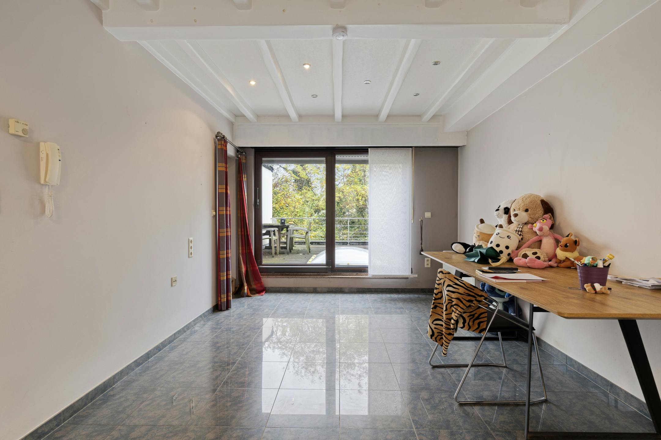 Huis te koop met 2 slaapkamers, terras en inpandige garage foto 3