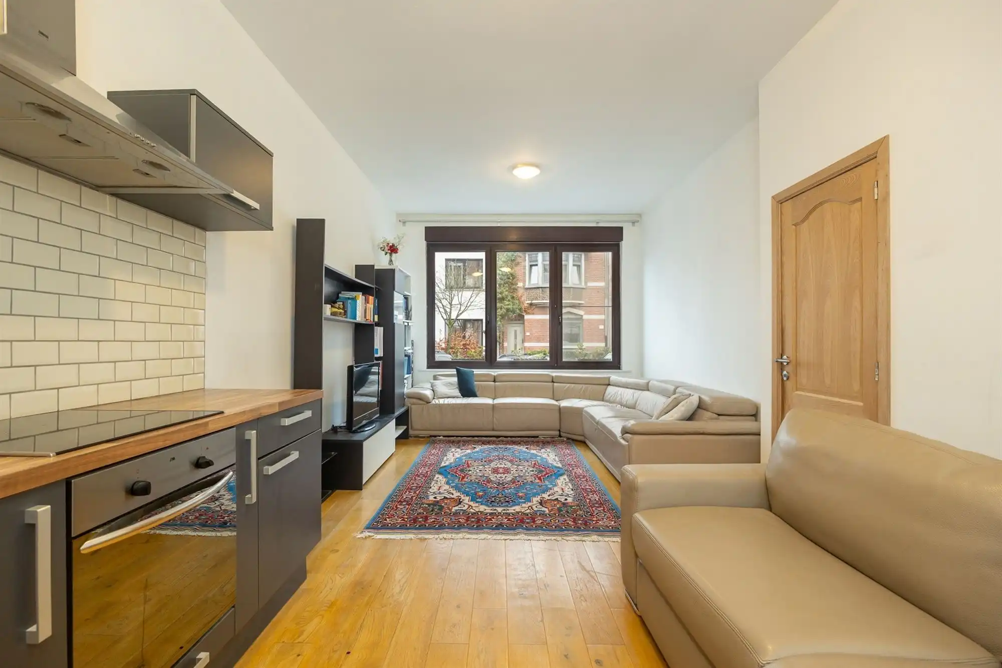 Instapklare woning met 2 à 3 slaapkamers en stadskoer foto 2