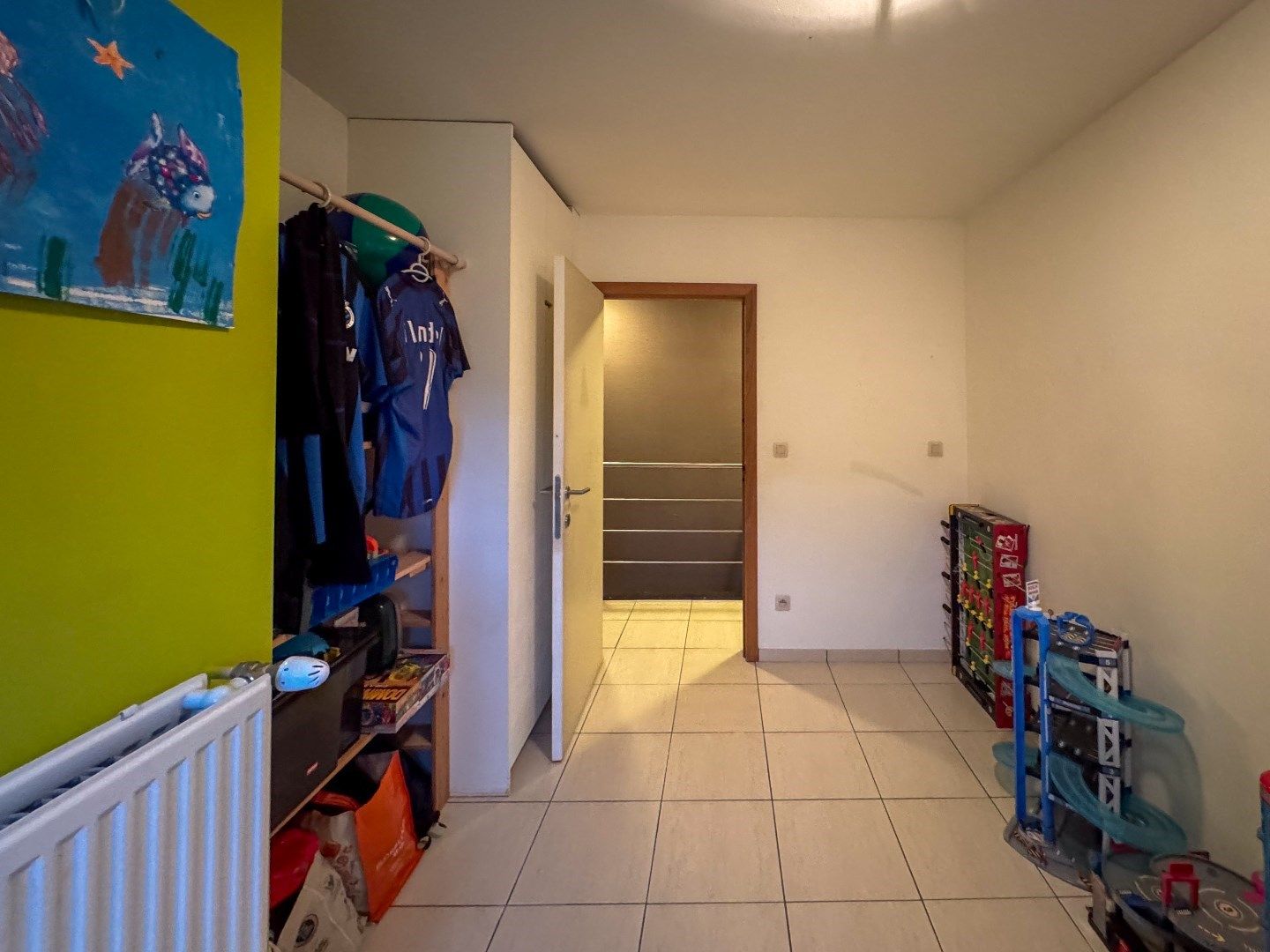 Rijwoning met 3 slaapkamers, garage en tuintje. foto 15