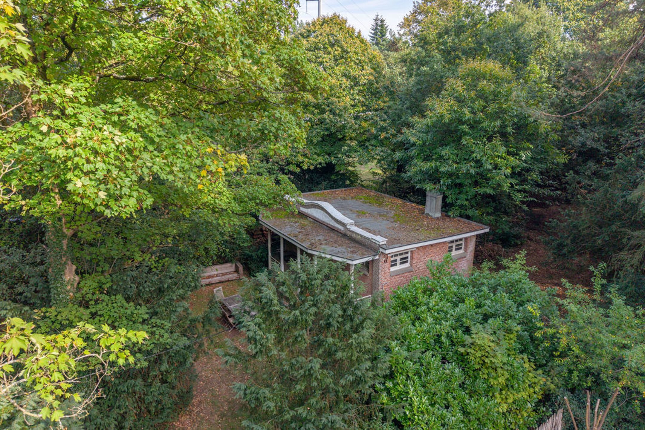 Bouwgrond / grondig te renoveren woning op 6.065m² grond. foto 14