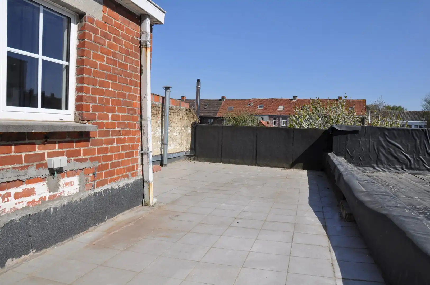 Instapklare woning met 3 slaapkamers, garage, stadstuin en groot zonneterras. foto 17