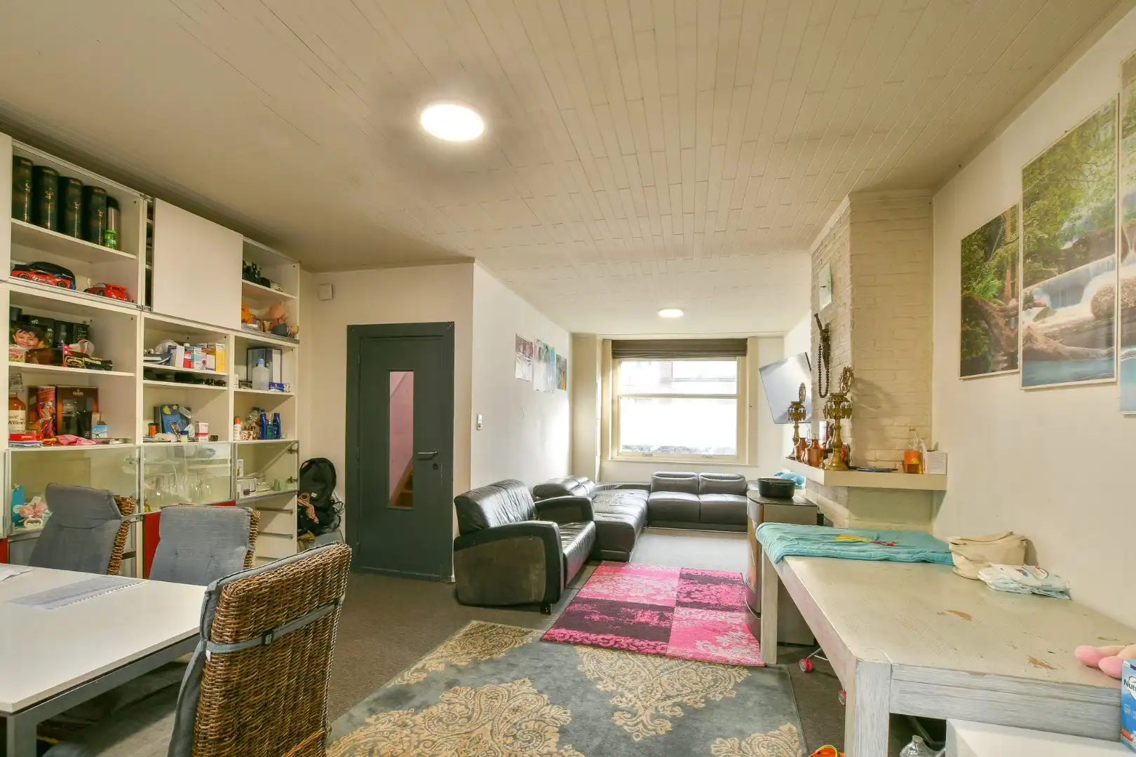 Centraal gelegen rijwoning met 4 slaapkamers en koer  foto 6