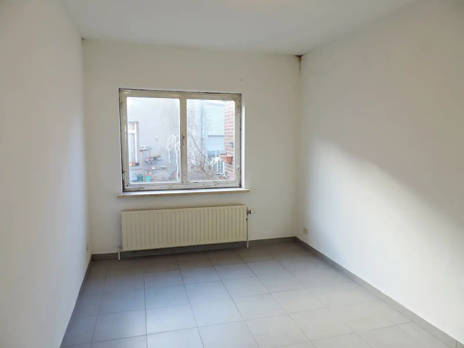 Opbrengsteigendom met handelsgelijkvloers en 2 appartementen foto 9