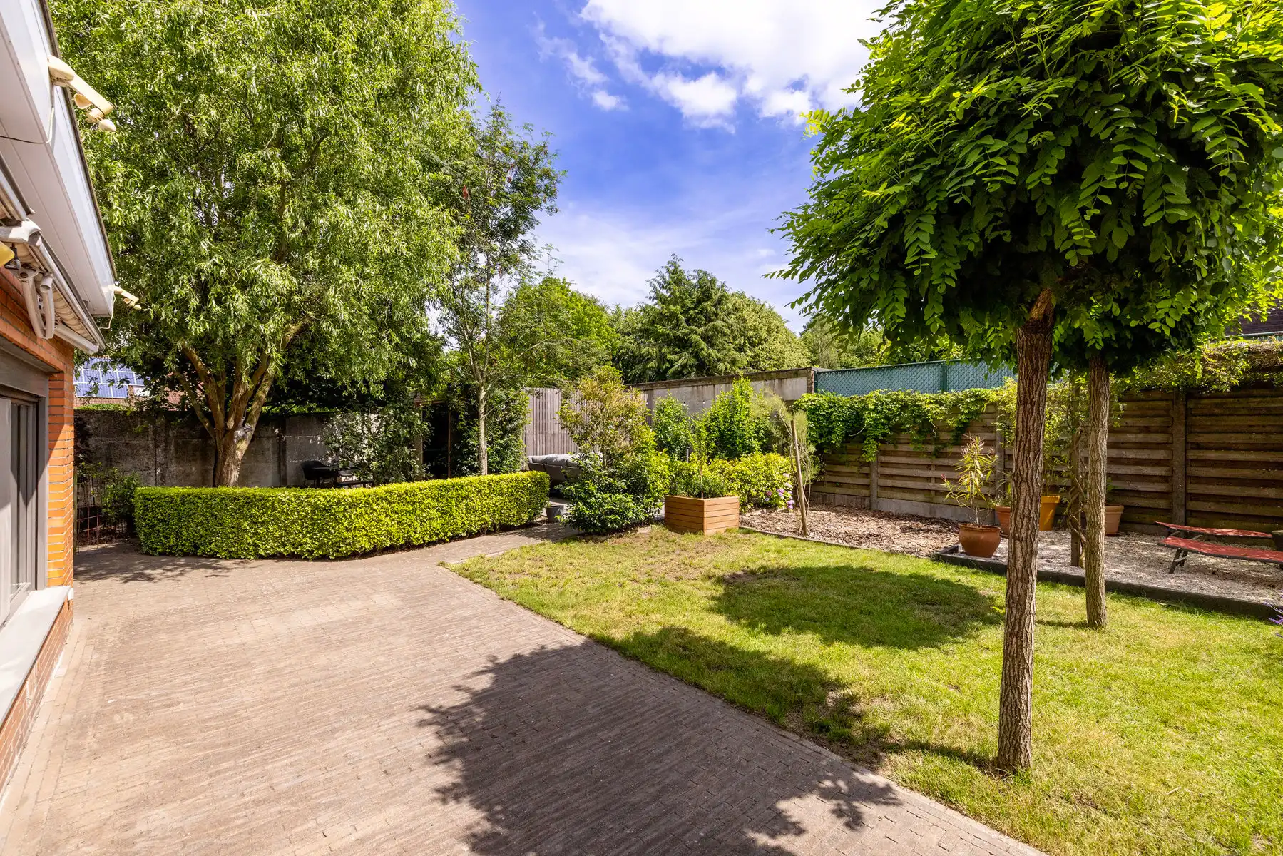 Instapklare woning met 4 slpks, 2 badks en gezellige tuin foto 24