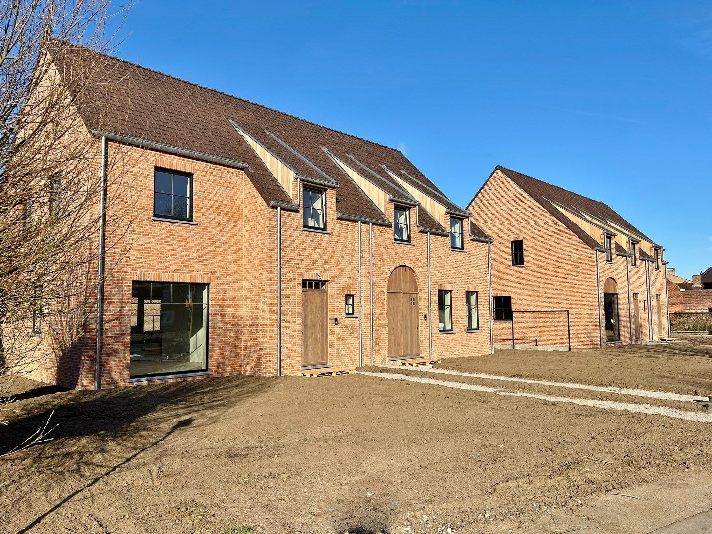 OPENDEUR 26/04 - Halfopen karaktervolle nieuwbouwwoningen met dubbele garage en tuin.  foto 4
