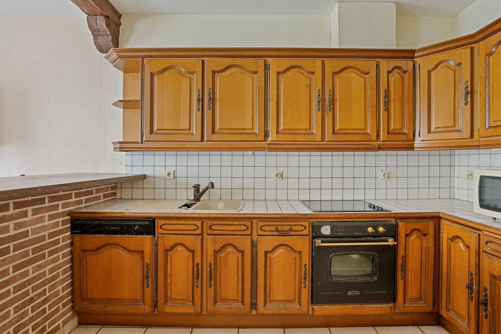 Super gelegen gelijkvloers appartement met voortuintje en garage foto 9