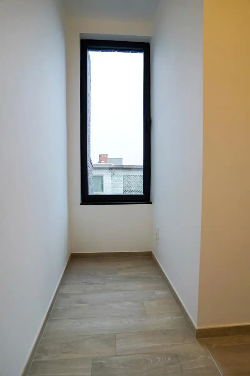 Energiezuinig duplex app met 1 slaapkamer + lift te Mechelen foto 13