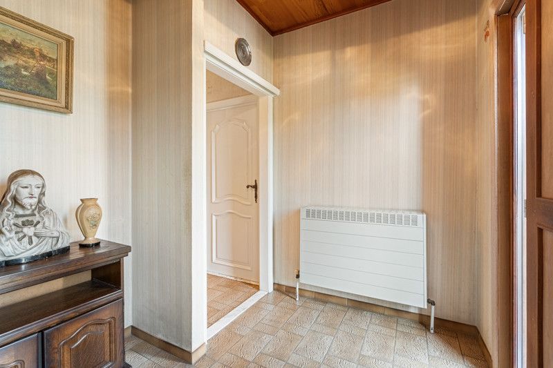 Gelijkvloerse woning met grote loods achteraan op 25are foto 4