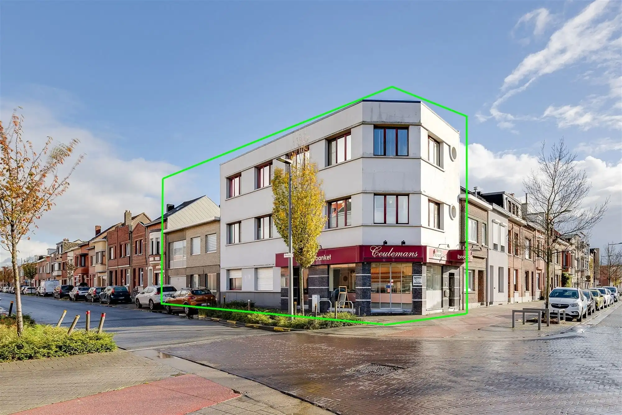 Uniek hoekperceel met handelshuis + garage + appt foto 2