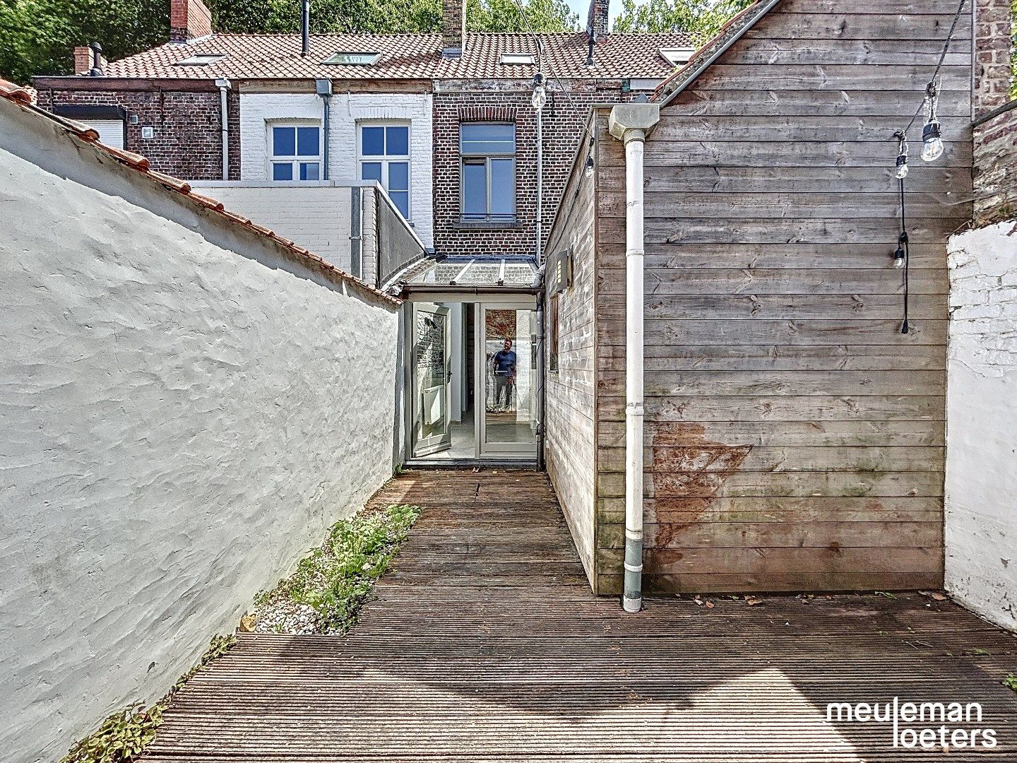Gerenoveerde instapklare stadswoning met stadsterras foto 14