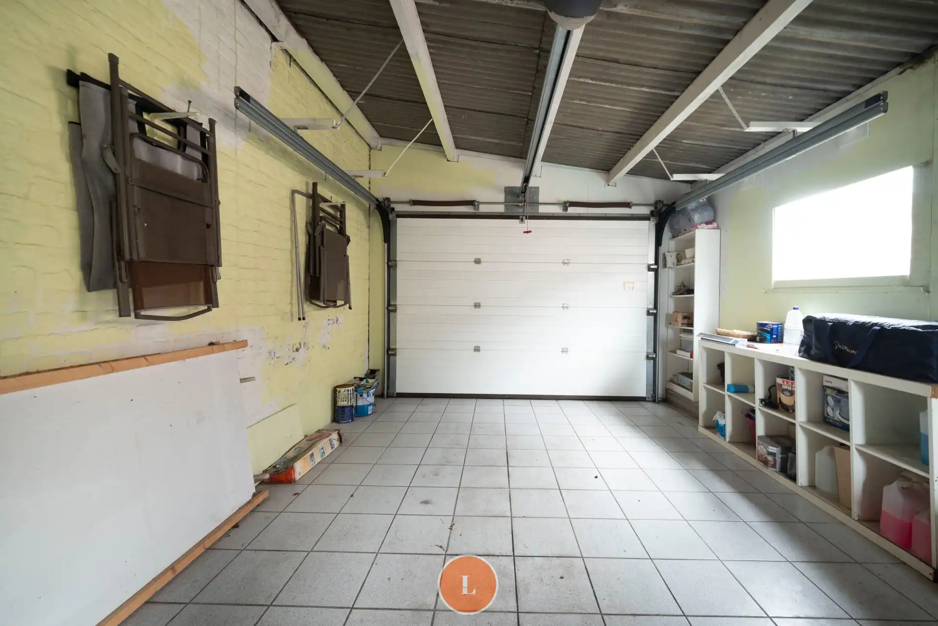 Instapklare woning met 2 slaapkamers, gezellige tuin en garage. foto 16