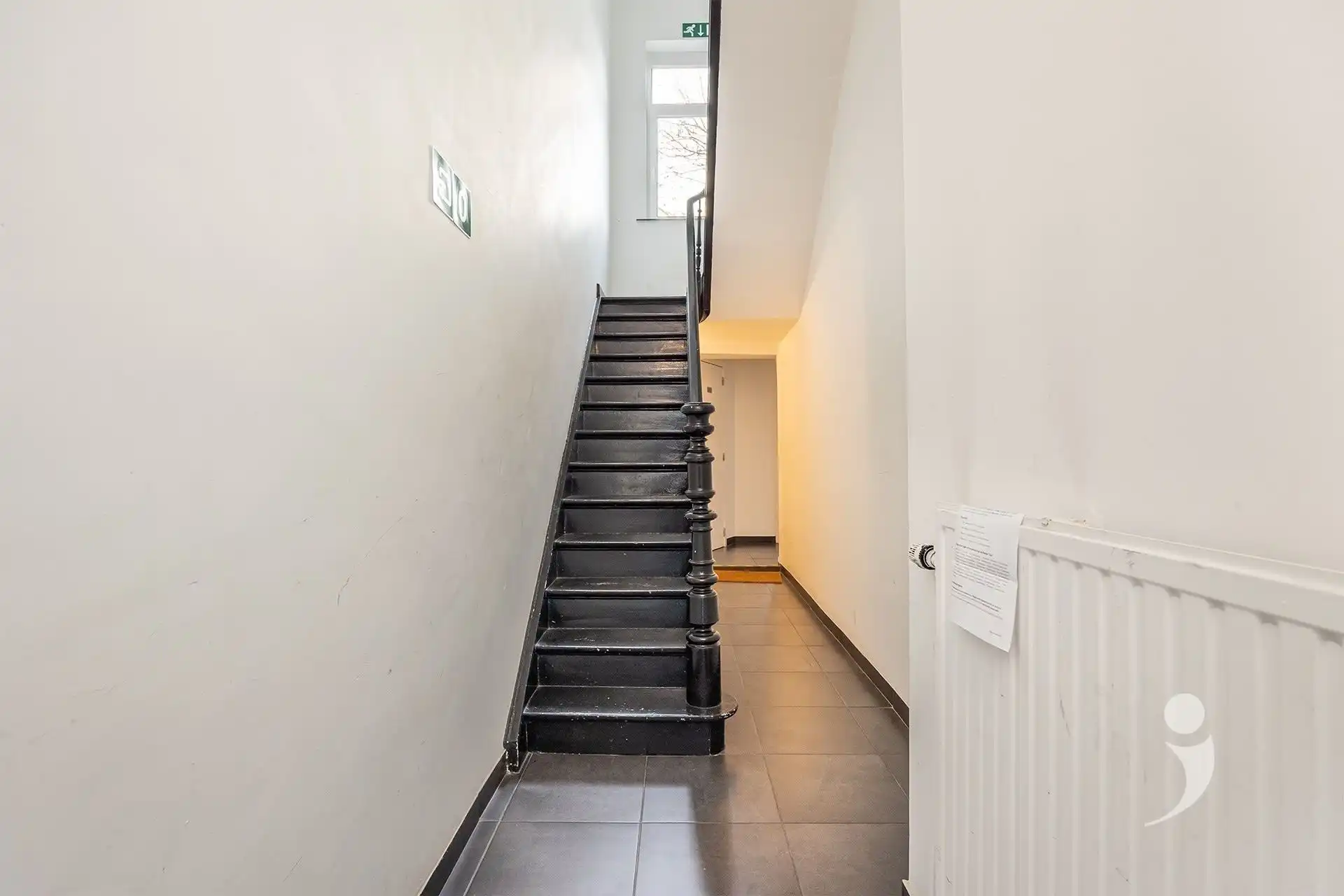Opbrengsteigendom met handelspand, studio en 6 studentenkamers in Leuven foto 25