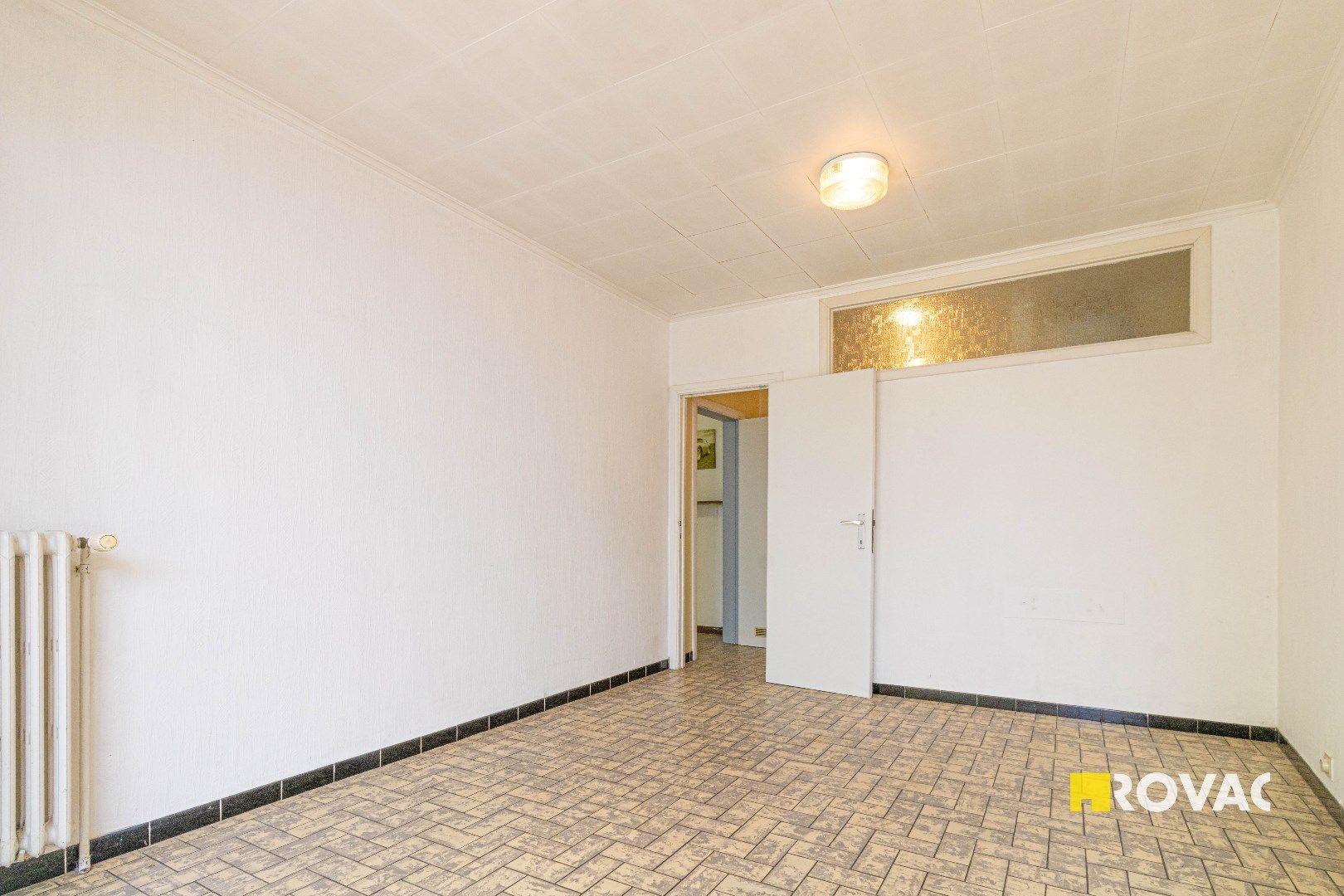 Opbrengsteigendom bestaande uit 2 appartementen met terras én tuin foto 9